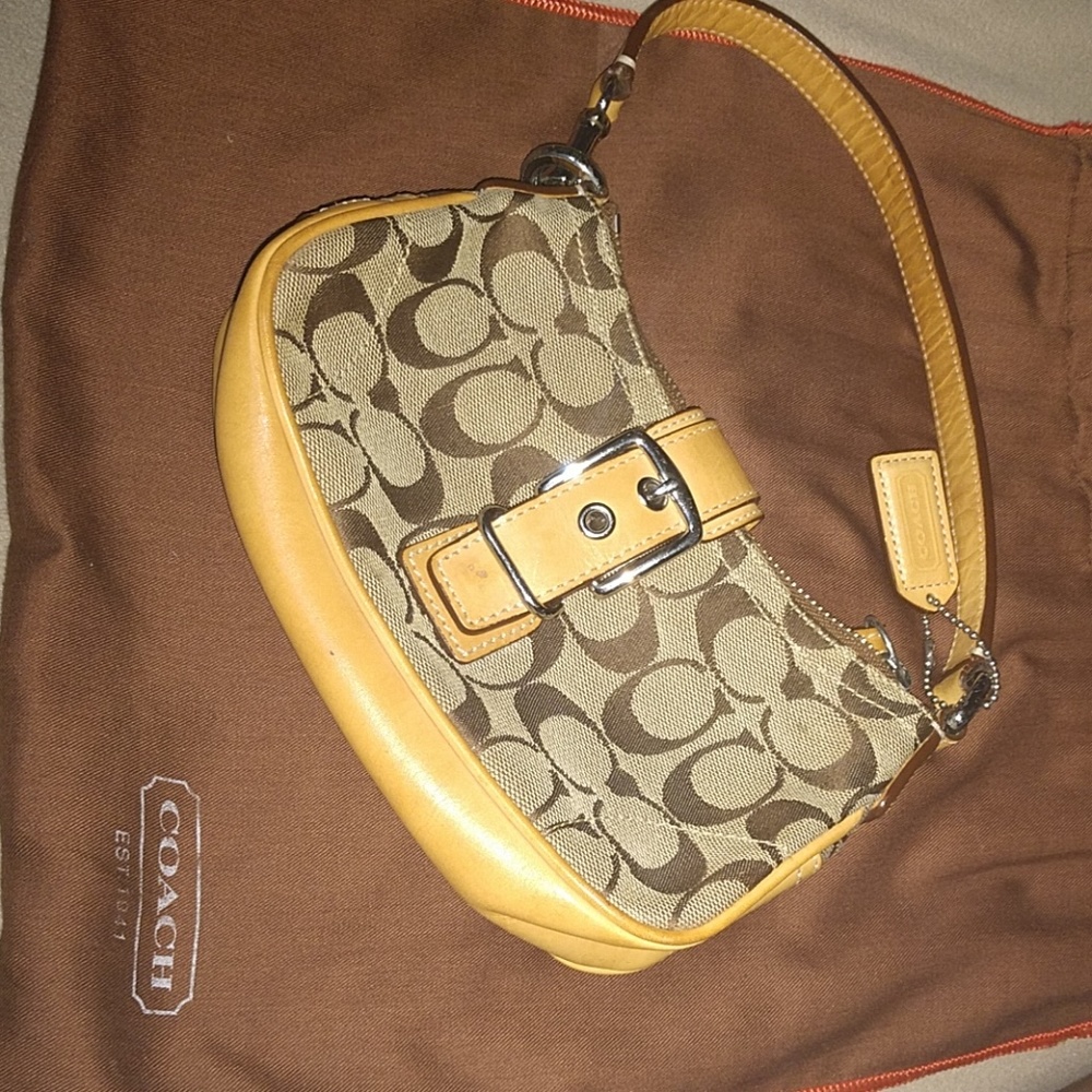 Tan coach hand bag